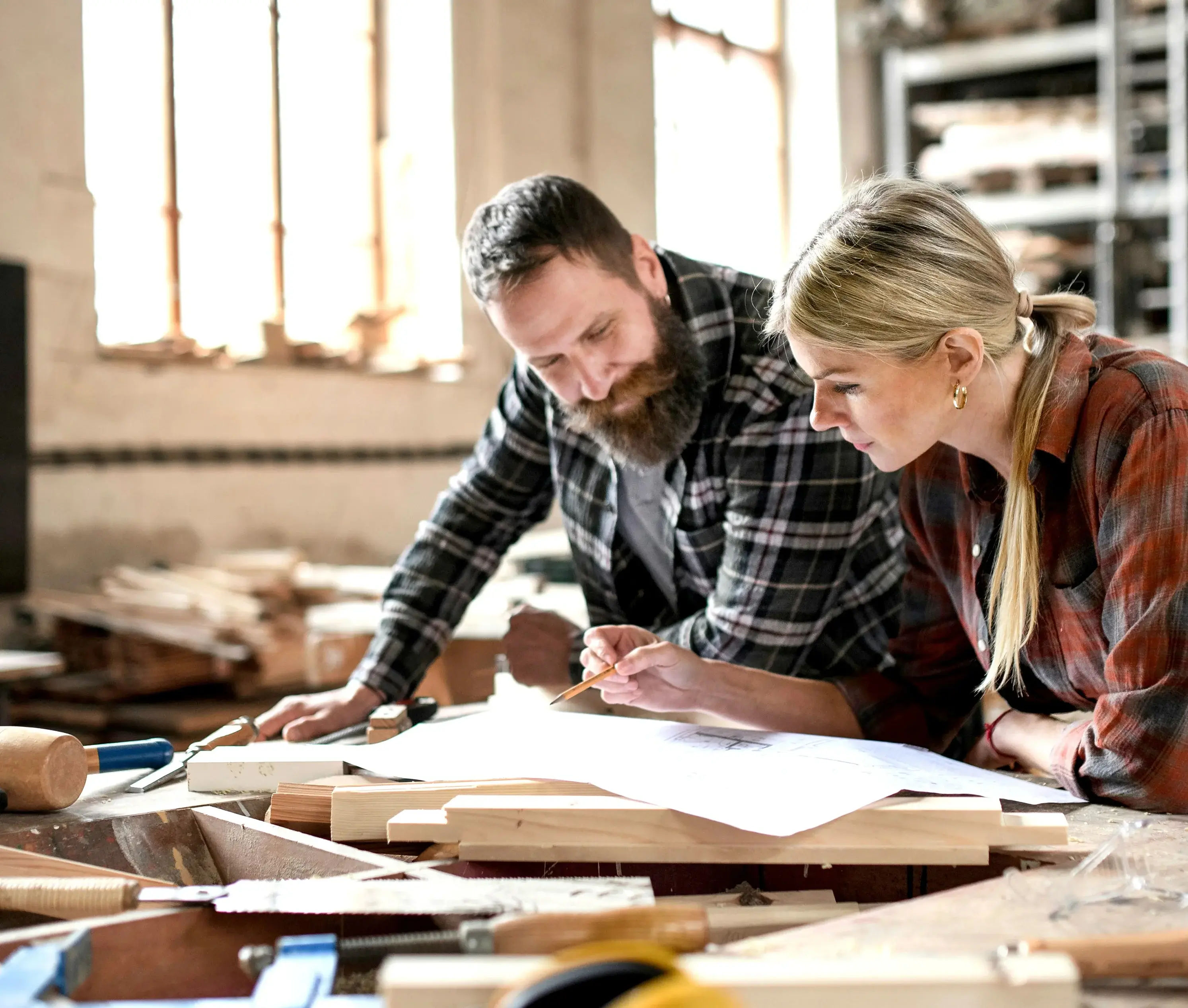 Precision-cut hardwood boards stacked for flooring